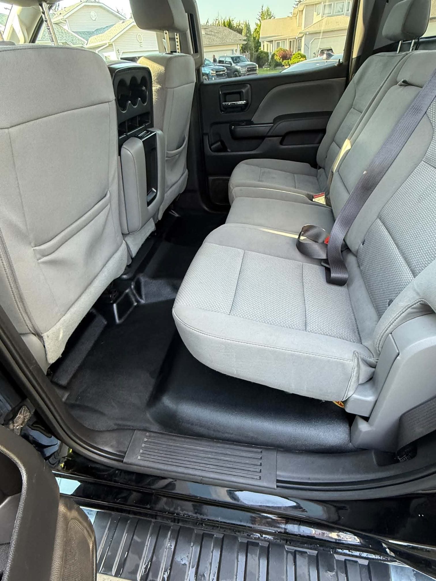 Chevrolet Silverado rear bench seat and floor after detailing, fully cleaned