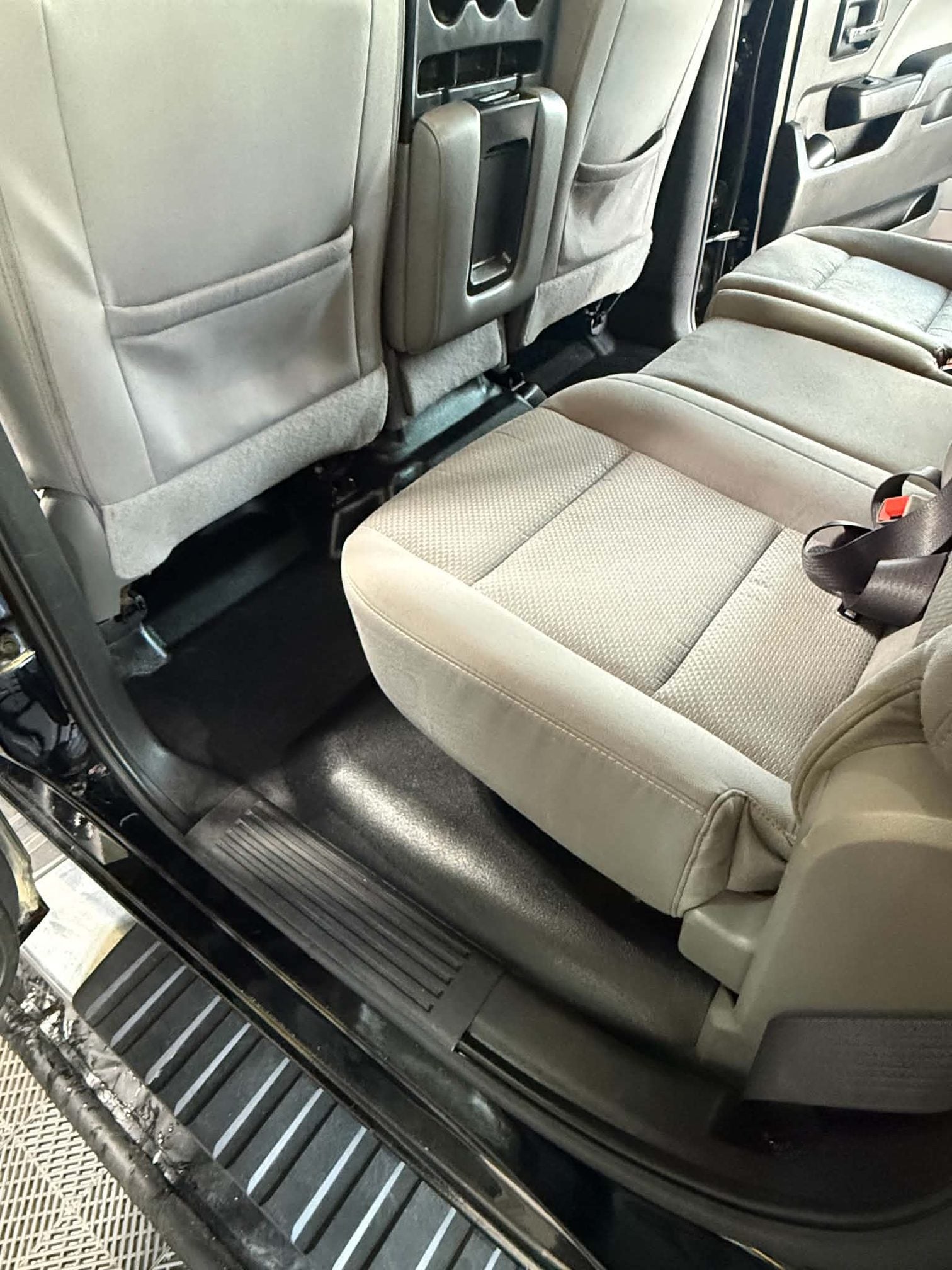 Chevrolet Silverado seat after upholstery extraction, debris removed